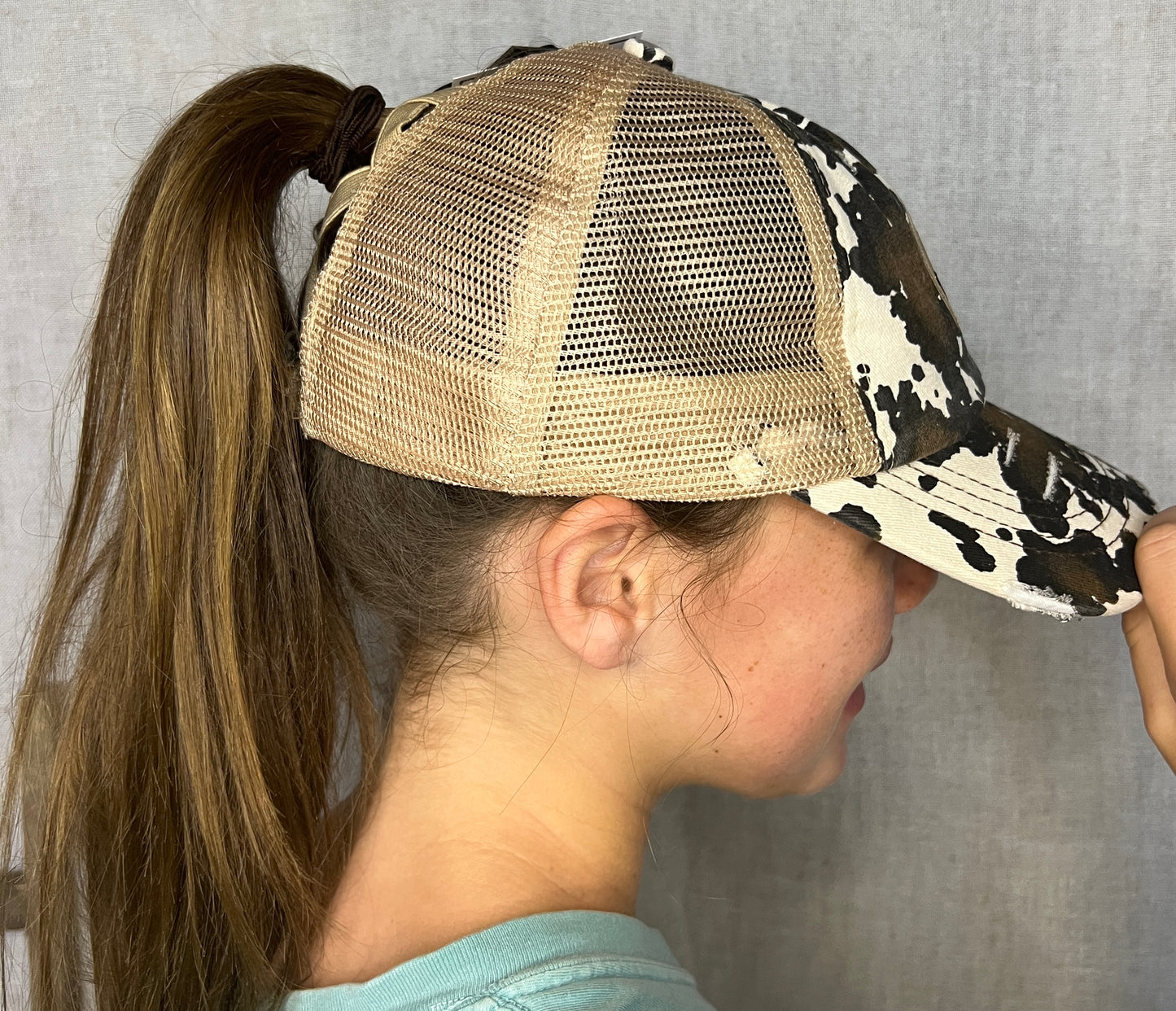 COW PRINT HAT W/ SMILEY GLITTER PATCH